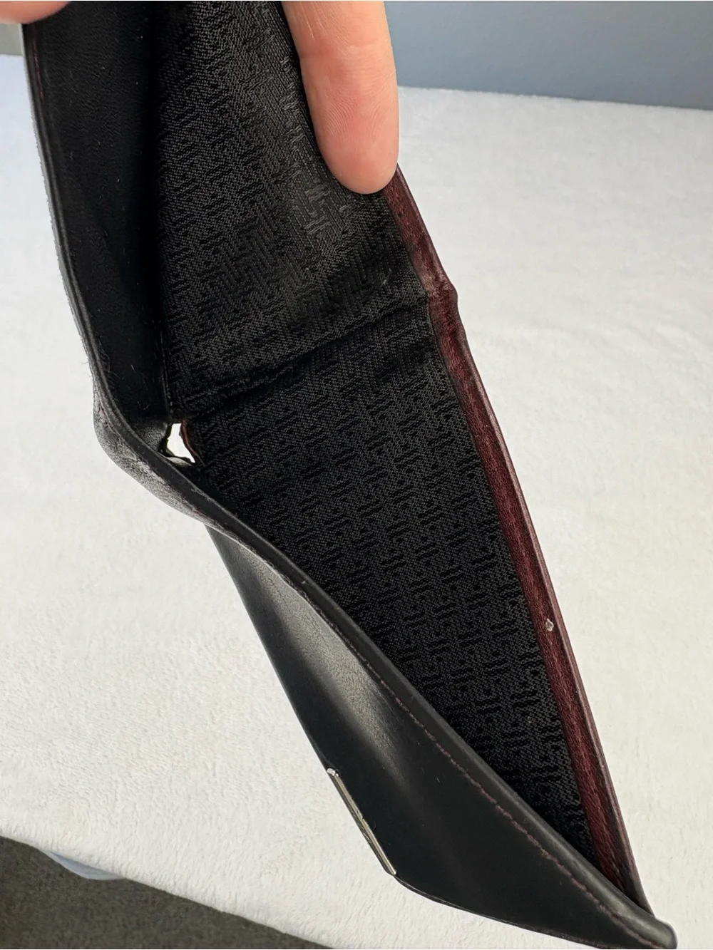 TUMI Black & Burgundy Leather Wallet